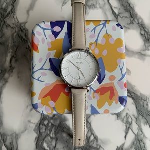 Cream and Silver colored Fossil watch